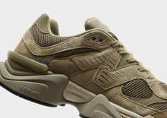 Retro and futuristic style combines with these men's 9060 trainers from New Balance. Exclusive to JD, these Olive sneakers have an airy mesh base and stitched suede and leather overlays for a panelled look. They feature plush padding around the ankle and to the tongue for a snug fit, while the foam midsole has ABZORB and SBS cushioning for a lightweight and responsive ride. With a diamond pattern on the rubber outsole that's taken from the archives, these trainers are finished off with signature New Balance branding at the sidewalls, heel and tongue. Green New Balance, Olive Sneakers, Balance Branding, New Balance 9060, Futuristic Style, Jd Sports, Diamond Pattern, Snug Fit, New Balance