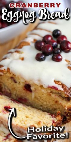 cranberry eggnog bread with icing and berries on top