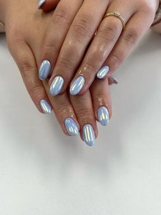 Baby blue and gold chrome Chrome Nails French Tip Blue, White And Light Blue Nail Designs, Light Blue And Pearl Nails, Blue Tips With Chrome, Light Blue Sparkly Nail Designs, Denim Blue Chrome Nails, North Carolina Blue Nails, Light Blue And Silver Nails Prom, White Nails With Blue Chrome