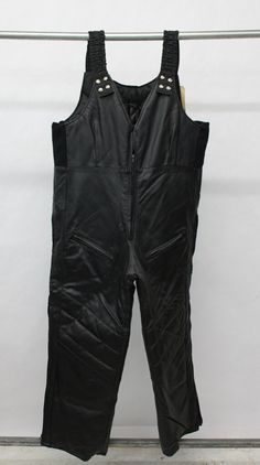 "DESCRIPTION: BEAUTIFUL & VERY STYLISH BLACK REAL GENUINE LEATHER SKI SNOW MOBILE PANTS FOR WOMEN!  IT HAS SUSPENDERS, ZIPPER CLOSURE, POCKETS WITH ZIPPER, STORM CUFFS AND ZIPPERS ON THE SIDE OF LEGS. THIS ITEM IS SHOWROOM NEW!  MEASUREMENTS:   SIZE: LARGE BUST CIRCUMFERENCE: 46\" HIP CIRCUMFERENCE: 49\" PANTS INSEAM LENGTH: 28\"  LENGTH : 58-59\" andre5149 Oliverfurs 9250 Parc Ave. #204, Montreal, Quebec, H2N 1Z2, Canada www.oliverfurswholesale.com oliver@oliverfurswholesale.com Toll free: 1-86 Casual Black Pants For Ski Season, Winter Full Length Leather Pants, Fitted Black Skiing Bottoms, Black Pants For Winter Sports, Snow Mobile, Raccoon Fur Coat, Black Leather Pants, Montreal Quebec, Pants Women