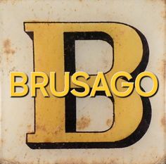 the letter b is written in yellow and black on an old rusty metal sign that says, brusago