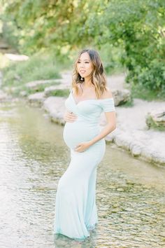 This baby blue Short-Sleeve Off the Shoulder Sweetheart Maternity Gown is the perfect photoshoot or special event maternity gown! With a cross over sweetheart bust, a slim fit bodice, a simple flare, and ultra-soft, stretch material this gown is equal parts comfort and elegance.  #maternitygown #maternityphotos #photoshoot #pregnant #32weeks Fitted V-neck Maternity Gown, Maternity Fitted Gown With Sweetheart Neckline, Maternity Gown With Sweetheart Neckline, Fitted Maternity Gown With Sweetheart Neckline, Maternity Fitted Dress With Sweetheart Neckline, Fitted Maternity Dress With Sweetheart Neckline, Maternity Dress With Sweetheart Neckline And Fitted Bodice, Fitted Off-shoulder Maternity Dress For Wedding, Fitted V-neck Maternity Bridesmaid Dress