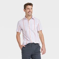 Refresh your smart-casual wardrobe with this Short-Sleeve Button-Down Shirt from Goodfellow & Co™. The short-sleeve shirt is made from cotton-blend fabric with added spandex for comfortable wear that moves with you. It features a collared neckline with a button-front design and a chest patch pocket for classic style. Showcasing a sleek striped pattern, you can pair it with anything from chinos to jeans for a variety of looks that you're sure to love sporting. Goodfellow & Co™: Where style & fit Pink Casual Shirt For Business Casual, Pink Casual Top For Business Casual, Smart Casual Wardrobe, Striped Short, Slim Fit Shorts, Mens Big And Tall, Slim Fit Men, Striped Shorts, Casual Wardrobe