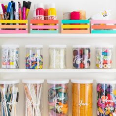 the shelves are filled with craft supplies and other things to make it look like they have been