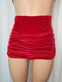 The Starlet High Waist Bottom in red is a handmade, full coverage bottom with ruched detailing and a lined crotch for comfort. Made with a stretchy and soft red velvet, this bottom offers a modest yet stylish look. Perfect for any body type, it provides extra coverage and a flattering fit. Optional color choices also available! Use the drop box! Made to order in sizes Small thru 3XL! Please allow 6 weeks to process your order! Each item is handmade ethically with love from the SugarDoll in sunny Sunny California, Drop Box, Soft Red, Ruched Top, Mauve Pink, High Waist Bottoms, Pink Velvet, Green Velvet, Blue Velvet