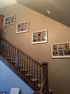 stairs with pictures on the wall above them