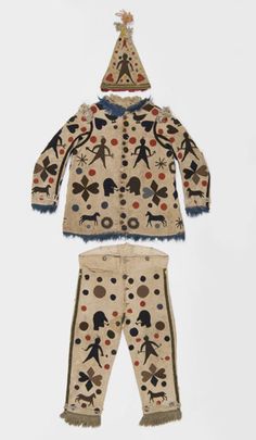 a child's outfit with an animal pattern on the front and side, including a hat