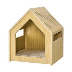 a wooden cat house with the door open