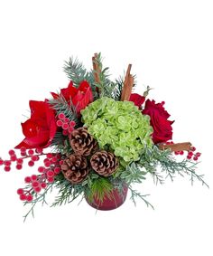 a red vase filled with green and red flowers