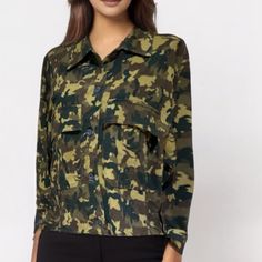 Long Sleeve Cotton Button Closure Relax Fit Collared Military Collared Utility Jacket For Fall, Fall Military Tops With Pockets, Military Style Tops With Pockets For Fall, Military Tops With Pockets For Fall, Camouflage Long Sleeve Workwear Outerwear, Camouflage Long Sleeve Outerwear With Button Closure, Camouflage Long Sleeve Outerwear For Work, Military Style Camouflage Tops With Pockets, Winter Military Collared Tops