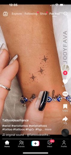 a woman's tattoo on the side of her stomach is shown in this screenshot