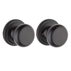 black door knobs with round handles on a white background, set of 2 pieces