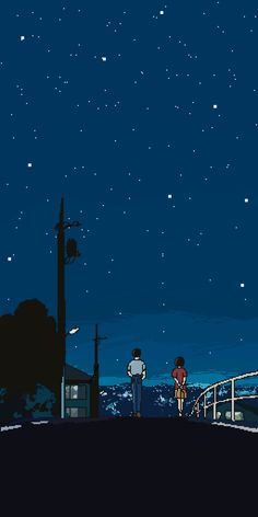 two people standing on a bridge looking at the night sky with stars in the background