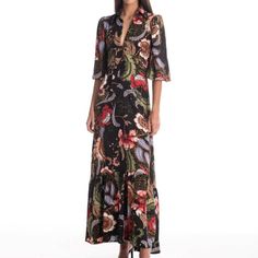 The April dress is perfect for when the event calls for some drama. This elevated design has all the elements you need to stand out in the best way. Dropped V-neckline Collar Long sleeves Exotic floral print Loose fitted Long lenght Easy Care Chic Floral Printed V-neck Dress, Elegant Printed V-neck Midi Dress, Printed V-neck Maxi Dress For Date Night, Elegant Floral Print V-neck Evening Dress, Floral Print Maxi V-neck Party Dress, Chic V-neck Dress With Notched Neckline And Floral Print, Formal Floral Print V-neck Dress, Formal V-neck Floral Print Dress, Formal Floral Dress With V-neck