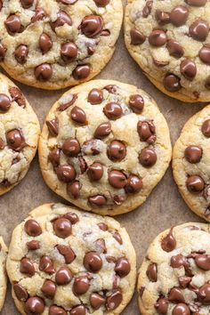 chocolate chip cookies are arranged on a baking sheet