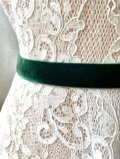 This soft velvet elastic belt wraps around the entire waist with a hook closure at back. Each belt measures a little less than 1" wide.  Belt is STRETCH VELVET Mannequin has a 27" waist You should measure around your waist with the dress on. These are so cute on tunics, tanks, and with everyday dresses, too.  Cheers! ♥ ♥ ♥ ♥ ♥ ♥ ♥ ♥ ♥ ♥ ♥ ♥ ♥ ♥  www.etsy.com/LveDve ♥ ♥ ♥ ♥ ♥ ♥ ♥ ♥ ♥ ♥ ♥ ♥ ♥ ♥ Velvet Mannequin, Dark Hunter Green, Dark Hunter, Wedding Sash Belt, Elastic Belt, Wedding Belts, Bridal Belt, Stretch Velvet, Wide Belt