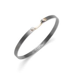 Modern Matte Finish Jewelry For Formal Occasions, Modern Bangle With Single Diamond, Modern Bangle With Single Diamond For Anniversary, Modern Diamond Bracelet With Single Diamond For Wedding, Modern Wedding Diamond Bracelet With Single Diamond, Modern White Gold Bangle With Single Cut Diamonds, Modern Wedding Bangle With Single Diamond, Modern White Gold Bracelet With Single Diamond, Elegant Matte Finish Jewelry For Gifts