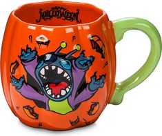 an orange and green mug with a cartoon character on it