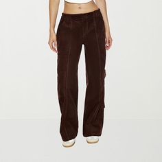 Cold-weather style isn't complete without a great pair of corduroy pants like this cargo pair from Forever 21's junior's and womens collection. They are made from soft cotton with a button-zip fly with an elastic-waistband, utility-style pockets, and wide legs.Closure Type: Button & ZipperFit: Baggy FitPockets: 2 Cargo Side Pockets, 2 Side Slip Pockets, 2 Back Flap PocketsRise: Mid RiseFiber Content: 100% CottonFabric Description: CorduroyInseam: LongLeg Style: Wide LegCare: Machine Wash, Tumble Y2k Fall Cargo Pants, Y2k Cargo Style Pants For Fall, Fall Y2k Cargo Pants, Y2k Cargo Pants For Fall, Y2k Cargo Style Bottoms For Fall, Y2k Fall Cargo Pants With Pockets, Trendy Brown Full Length Cargo Pants, Trendy Brown Full-length Cargo Pants, Trendy Full-length Brown Cargo Pants