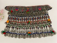 Afghan necklace, Afghan vintage choker, Afghan jewelry. It is all handmade and is made with multicolor gems and beads.  It is for all kinds of cultural occasions. Some designs may differ due to the handwork and vintageness of the item. Traditional Colorful Bead Choker, Traditional Handmade Necklaces For Festival, Handmade Traditional Necklace For Festivals, Bohemian Multicolor Tilla Choker, Multicolor Beaded Choker For Celebration, Traditional Beaded Necklaces For Festival Gift, Adjustable Multicolor Necklace For Ceremonial Occasions, Vintage Multicolor Jewelry For Festivals, Traditional Multicolor Choker For Festival