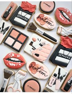 some cookies that have makeup and lipstick on them