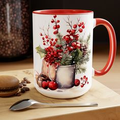 a coffee mug decorated with holly and berries