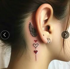 a woman with tattoos on her neck and behind the ear is an image of two hearts