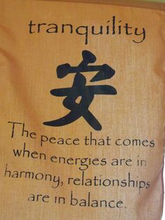 a sign that says tranquility the peace that comes when energies are in harmony, relationss are in balance