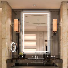 a bathroom with marble walls and flooring, mirrors on the wall, two sinks in front of a large mirror