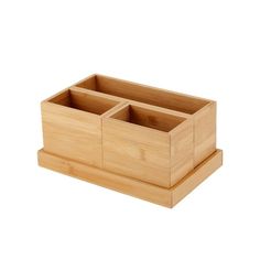 a wooden box with three compartments on it