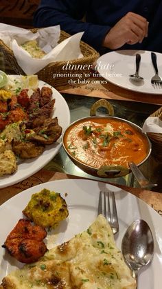 plates of food on a table with utensils