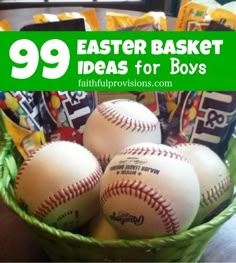 a basket filled with baseballs and candy bar on top of a wooden table next to a window