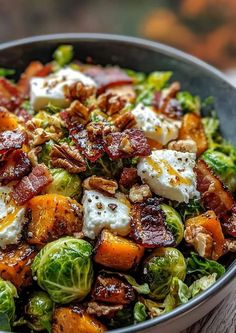 brussel sprouts with bacon and eggs in a bowl on a table