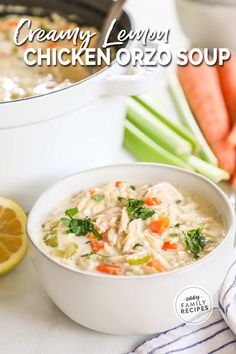 a bowl of chicken orzo soup with carrots and celery on the side