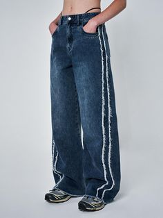 This is a casual and comfortable pants made out of high quality cotton 100% denim fabric. With design detail of cut off detail on the hem and fringe detail from the hip to ankle, it gives a comfortable and trendy mood.- Cut off detail on the hem- 13 oz denim fabric- Fringe detail from the hip extending to ankle- Slim boots cut silhouette Streetwear Medium Wash Flare Jeans With Frayed Hem, Streetwear Frayed Hem Flare Jeans In Medium Wash, Urban Flare Jeans With Frayed Hem, Urban Dark Wash Jeans With Frayed Hem, Urban Cotton Jeans With Frayed Hem, Urban Denim Jeans With Frayed Hem, Frayed Hem Pants For Fall Streetwear, Relaxed Fit Jeans With Frayed Hem For Streetwear, Dark Wash Flare Jeans With Frayed Hem For Streetwear