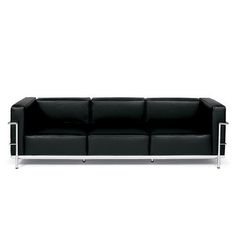 a black leather couch with chrome legs on a white background, viewed from the front