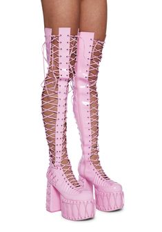 will have ya feelin' the moonlight magic. Embrace the lunar hour in these thigh high lace-up boots that have a vegan leather construction,a vinyl fashion, side zip closures, and exxtra high platforms with chunky block heels. Trendy Pink Lace-up Boots, Pink Faux Leather Party Boots, Pink Fitted Faux Leather Boots, Trendy Lace-up Boots For Alternative Fashion, Pink Synthetic Platform Boots For Party, Edgy Pink Party Boots, Edgy Pink Boots For Spring, Pink Platform Boots, Lace Up Platform Boots