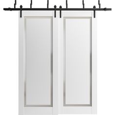 two white doors with black handles and bars