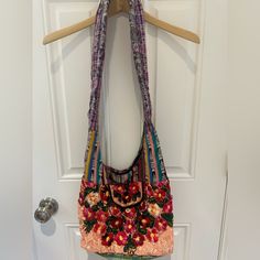 Gorgeous Handmade Beaded Carry All Bag. Never Worn And In Perfect Condition. Bohemian Embellished Bags For Vacation, Bohemian Embellished Bag For Vacation, Handmade Purple Bags For Festival, Bohemian Purple Shoulder Bag With Adjustable Strap, Purple Beaded Bags For Everyday Use, Beaded Purple Bag For Everyday Use, Purple Beaded Bag For Everyday Use, Multicolor Embroidered Beaded Shoulder Bag For Everyday Use, Festival Bags With Multicolor Embroidery And Beaded Details