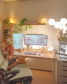 a computer desk with two monitors and a chair in front of it, along with other office supplies