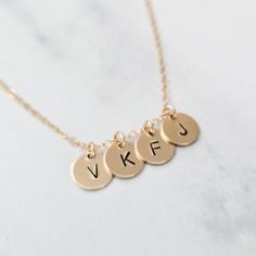 Clean lines and block letters are classic for everyday wear and the recipient of this gift will love the personalized touch for a simple necklace. This dainty pendant can be personalized with an INITIAL hand-stamped in uppercase or lowercase sans serif block font. *the typewriter font pictured is to show the largest size and rose gold option About the jewelry: • The tiny disc tag comes in extra small, small, and medium sizes as shown in the photos. It is very dainty and small. • You can get 1 up Dainty Hand Stamped 14k Gold Charm Necklaces, Dainty Hand Stamped 14k Gold Necklace, Dainty Hand Stamped Necklaces For Personalized Gift, Minimalist Charm Necklaces For Best Friend Gift, Dainty Hand Stamped Necklace For Personalized Gift, Minimalist Charm Necklace For Best Friend Gift, Dainty Hand-stamped Jewelry For Personalized Gift, Dainty Initial Necklace With Charms For Personalized Gift, Hand Stamped Initial Pendant Jewelry For Mom