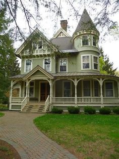 an old victorian style house in the country