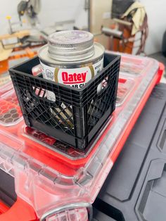 a container with some type of glue on top of it