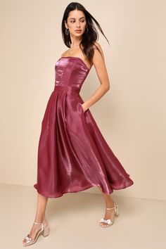 If you're aiming to stun, you'll always make the right choice when you wear the Lulus Radiant Direction Mauve Purple Strapless Midi Dress With Pockets! Lightweight woven organza, with a luxe sheen throughout, shapes a strapless, corset-inspired bodice with a subtle sweetheart neckline, no-slip strips, hidden supportive boning, seaming details, and stunning sheer panels at the back. Banded waist tops a flaring skirt with side seam pockets, box pleats, and hidden tulle for volume, finishing at a m Strapless Organza, Midi Dress With Pockets, Mauve Purple, Guest Attire, Organza Dress, Mauve Dress, Wedding Attire Guest, Strapless Midi Dress, Guest Outfit