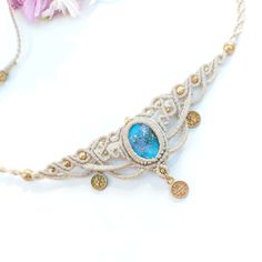 ☥Elevate your style with this stunning Turquoise Stone Macrame choker! Handcrafted with care and attention to detail, this beautiful choker features a vibrant turquoise stone adorned with the ancient Egyptian symbol of life, the Ankh. Perfect for adding a touch of bohemian flair to any outfit, this unique piece is sure to make a statement.Whether you're dressing up for a bridal necklace or adding color to your everyday look or festive costumes, this Turquoise Ankh choker is the perfect accessory Ceremonial Handmade Adjustable Necklace, Adjustable Bohemian Jewelry For Ceremonies, Handmade Adjustable Choker For Ceremonial Occasions, Adjustable Bohemian Necklaces For Weddings, Bohemian Adjustable Necklaces For Wedding, Stone Macrame, Macrame Choker, Ankh Symbol, Ancient Egyptian Symbols