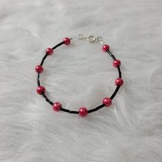 Handmade Beaded Bracelet Red And Black Beads. Spring Hook Closure. Support An Artist! Not Hypoallergenic. Please See Photos For Measurements. Red Beaded Bracelets With Tiny Beads For Party, Red Beaded Bracelet With Tiny Beads For Parties, Red Tiny Beaded Bracelets For Party, Adjustable Red Beaded Chain Bracelet, Elegant Red And Black Beaded Bracelets, Red Bracelets With Black Round Beads, Aquamarine Bracelet Beads, Rose Quartz Bracelet Beads, Aquamarine Beads