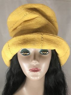 This is a wide brim cloche hat made of soft luxurious, perfectly imperfect, Mud Cloth in a rare mustard yellow.  It has understated elegance in style and can be worn, for any occasion during any season.   The hat is one of a kind, but it can be made for you in, either the same or a different color.  It is versatile and its look can be changed simply by your mood.  - Handmade - Mud Cloth - Black satiny lining  - Generous sizing will fit large head sizes and big hairdos Size: Can be made to fit yo Cloche Hats, Yellow Hat, Elegant Hats, Unique Hats, Weaving Projects, Slow Stitching, Cloche Hat, Handmade Hat, Understated Elegance