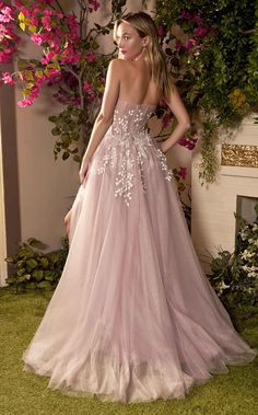 Lovely long Dress by Andrea and LeoLook absolutely dazzling in Andrea and Leo A1029 Dress. This lovely piece features a a-line silhouette and glittering accents. The sleeveless bodice has a strapless neckline and a natural waist.