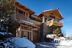 a large house with snow on the ground