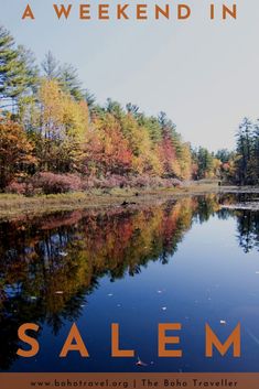 a lake surrounded by trees with the words salem written in orange and blue on it